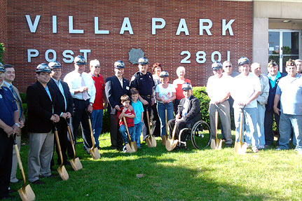 front of VFW building with golden shovels group photo